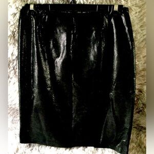 Shiny black leather skirt